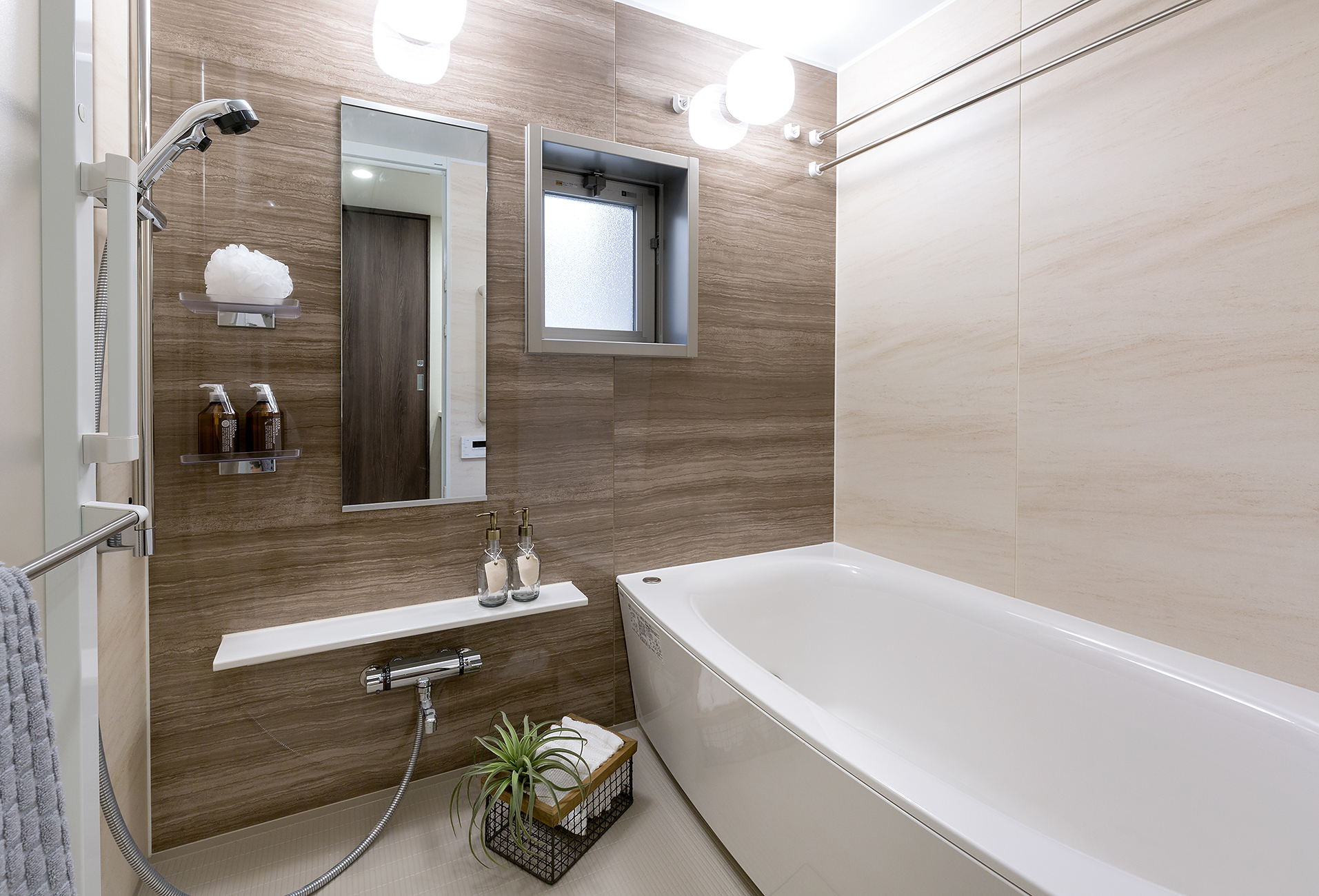 Renovated kitchen with white cabinetry, large island, and pendant lighting in Wilmington NC