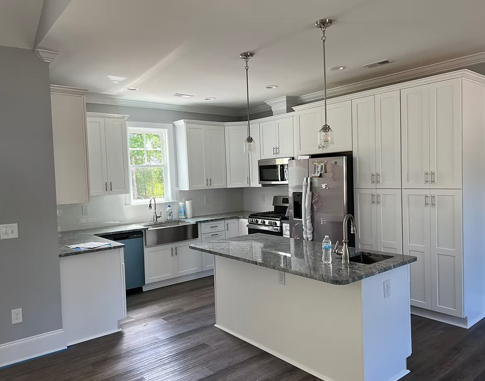 Bright home interior with custom kitchen and open living space in Coastal North Carolina